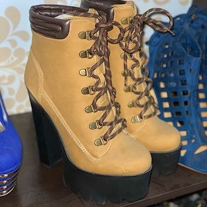 Never worn! High-heeled boot. Sz. 9 (Very tall 5” or higher heel)